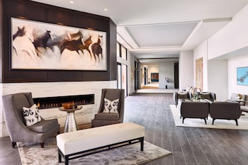 Relax in style with a comfortable seating arrangement and a warm fireplace. at ADERO Scottsdale Resort, Autograph Collection