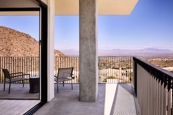 Enjoy breathtaking views of the desert landscape from this balcony with a clear view of distant mountains. at ADERO Scottsdale Resort, Autograph Collection