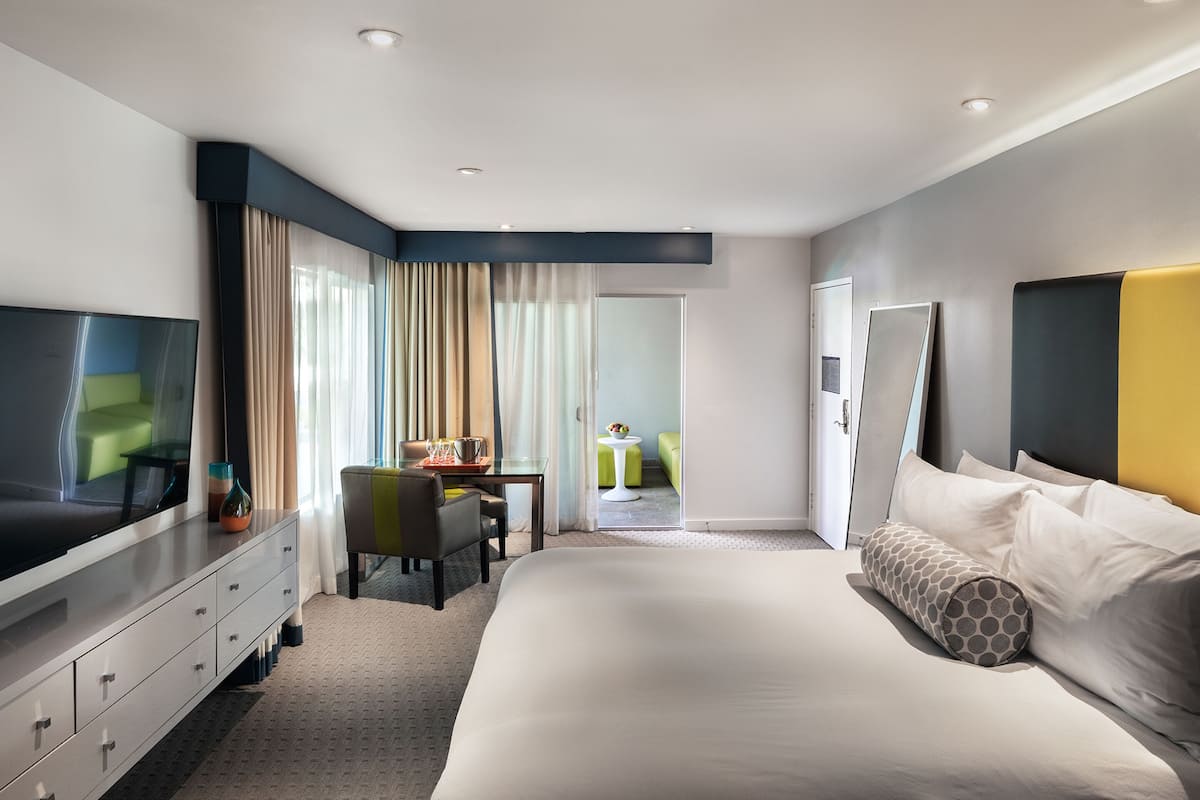 studio king suite | frette italian sheets, premium bedding, down duvets, pillow-top beds