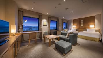 Habitación Deluxe con 2 camas individuales, para no fumadores | Minibar, caja de seguridad en la habitación y escritorio