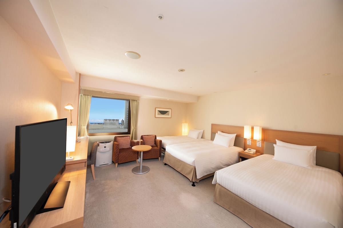 Superior Triple Room, Non Smoking | Minibar, in-room safe, desk, blackout curtains