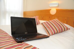 Premium bedding, desk, iron/ironing board, free WiFi