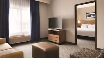Premium bedding, down comforters, pillowtop beds, in-room safe
