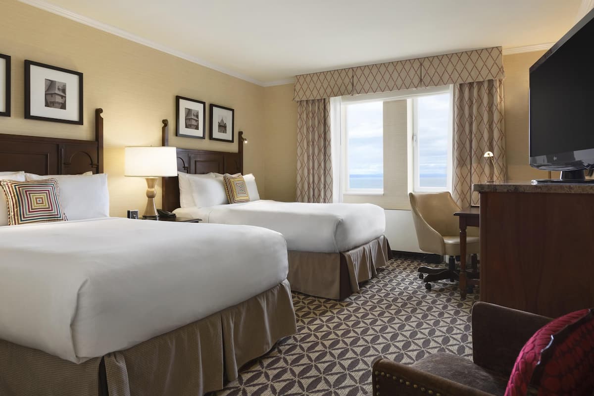 Hypo-allergenic bedding, pillow-top beds, minibar, in-room safe