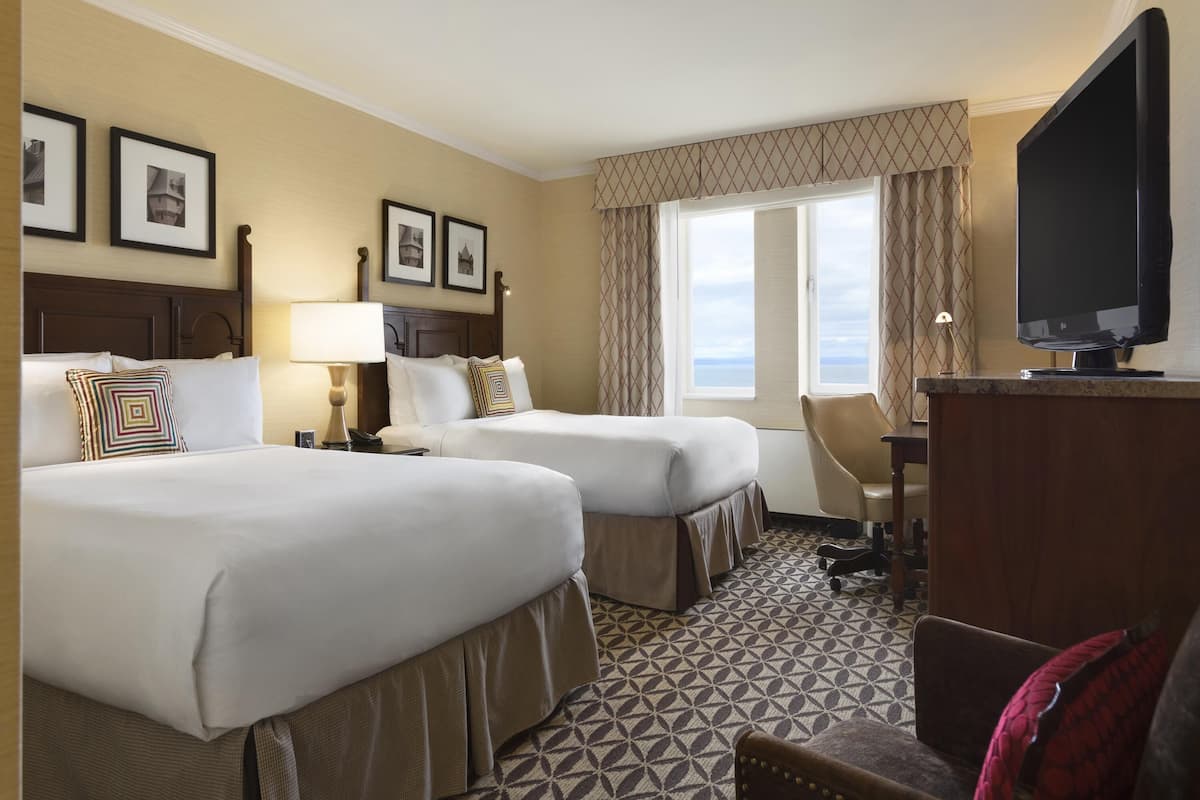 Hypo-allergenic bedding, pillow-top beds, minibar, in-room safe