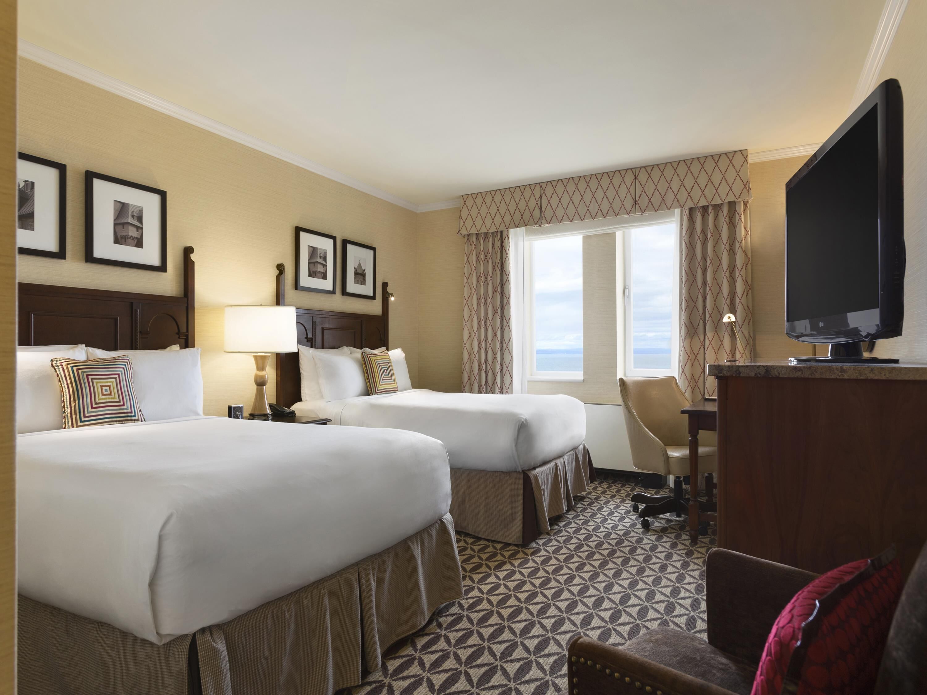 Hypo-allergenic bedding, pillow-top beds, minibar, in-room safe
