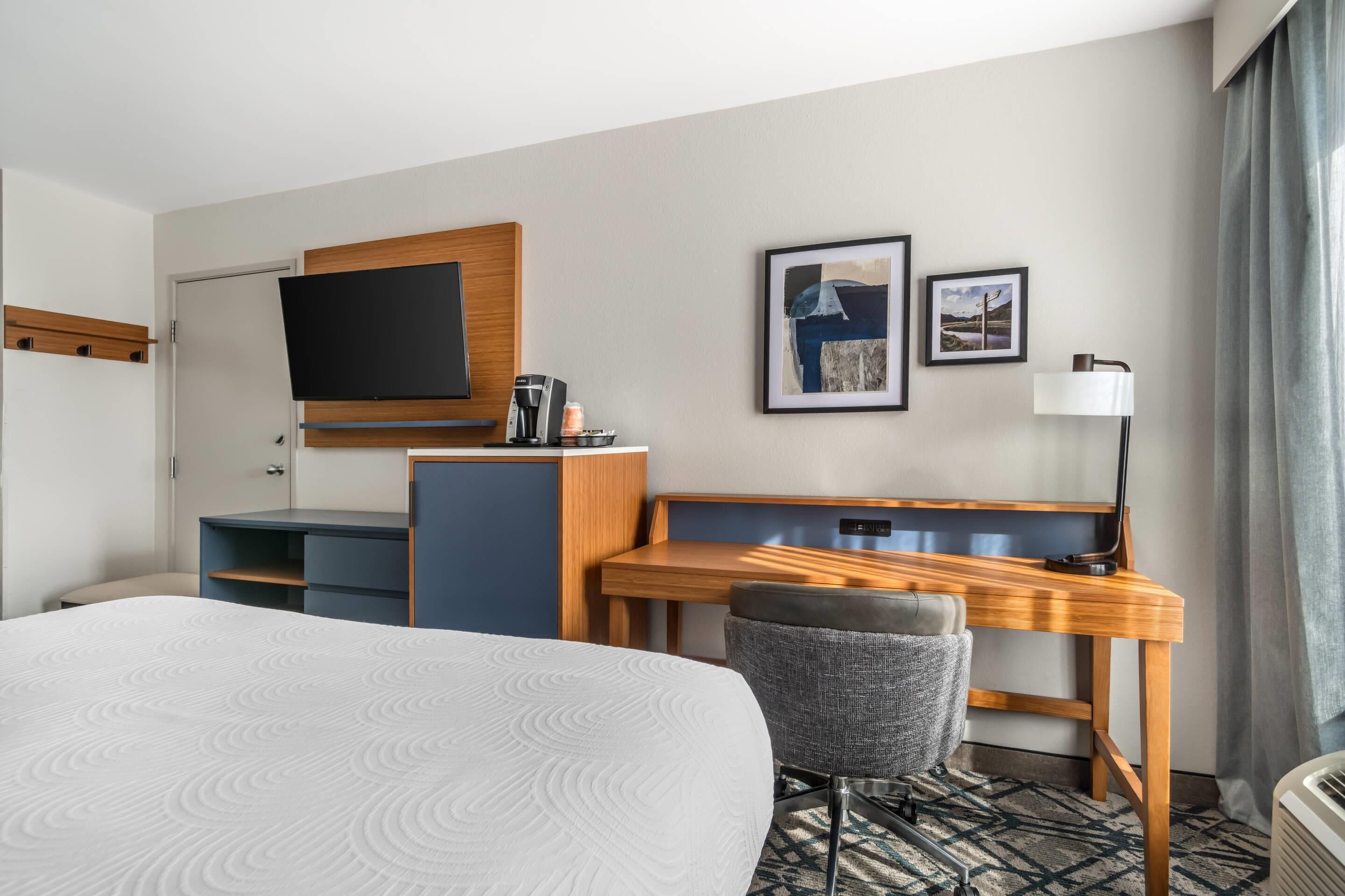 Room, 2 Queen Beds, Non Smoking | In-room safe, desk, iron/ironing board, free cribs/infant beds