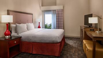 Suite, 1 King Bed, Non Smoking | Desk, blackout drapes, iron/ironing board, free WiFi