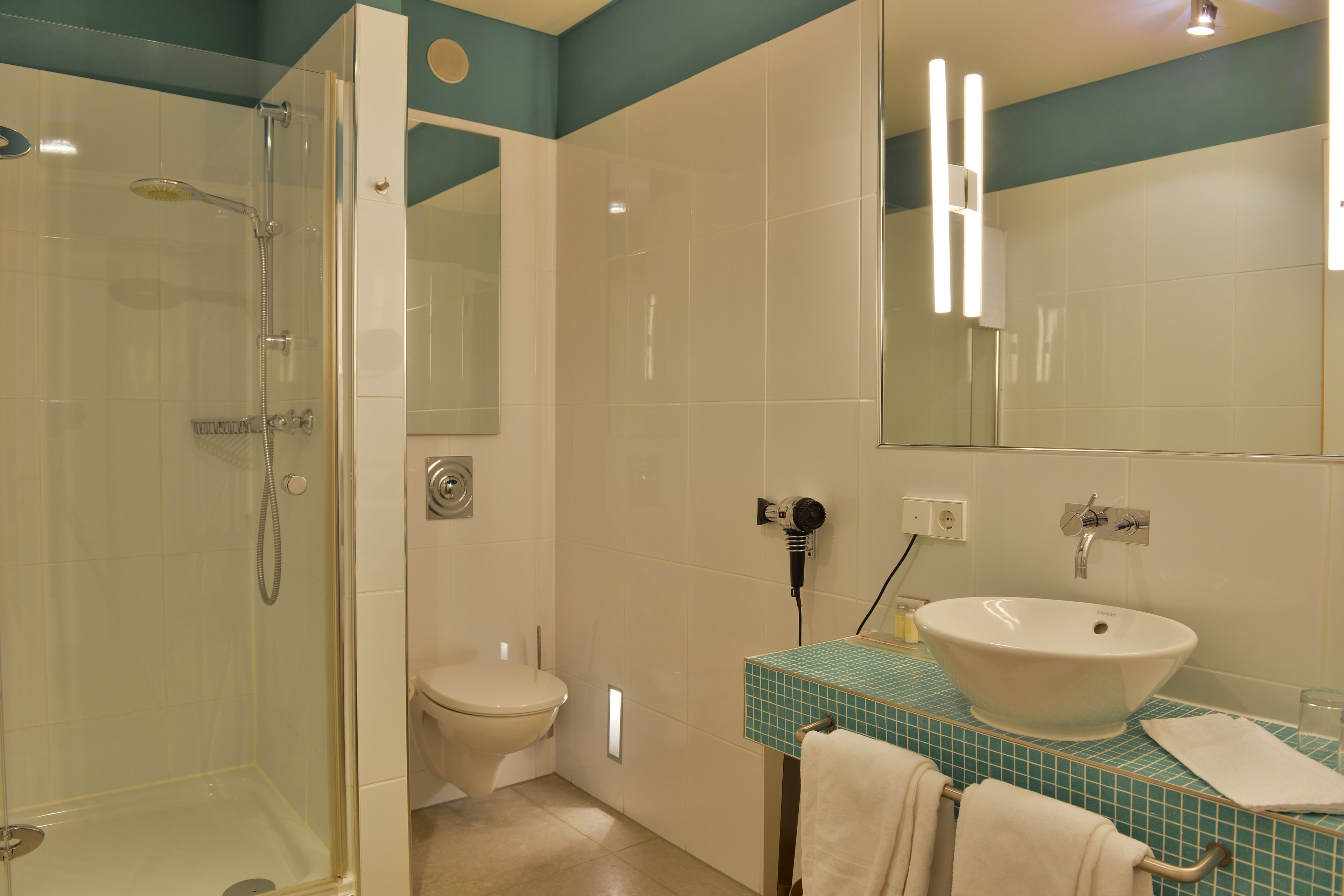 superior double room | bathroom | shower, free toiletries, hair dryer, slippers
