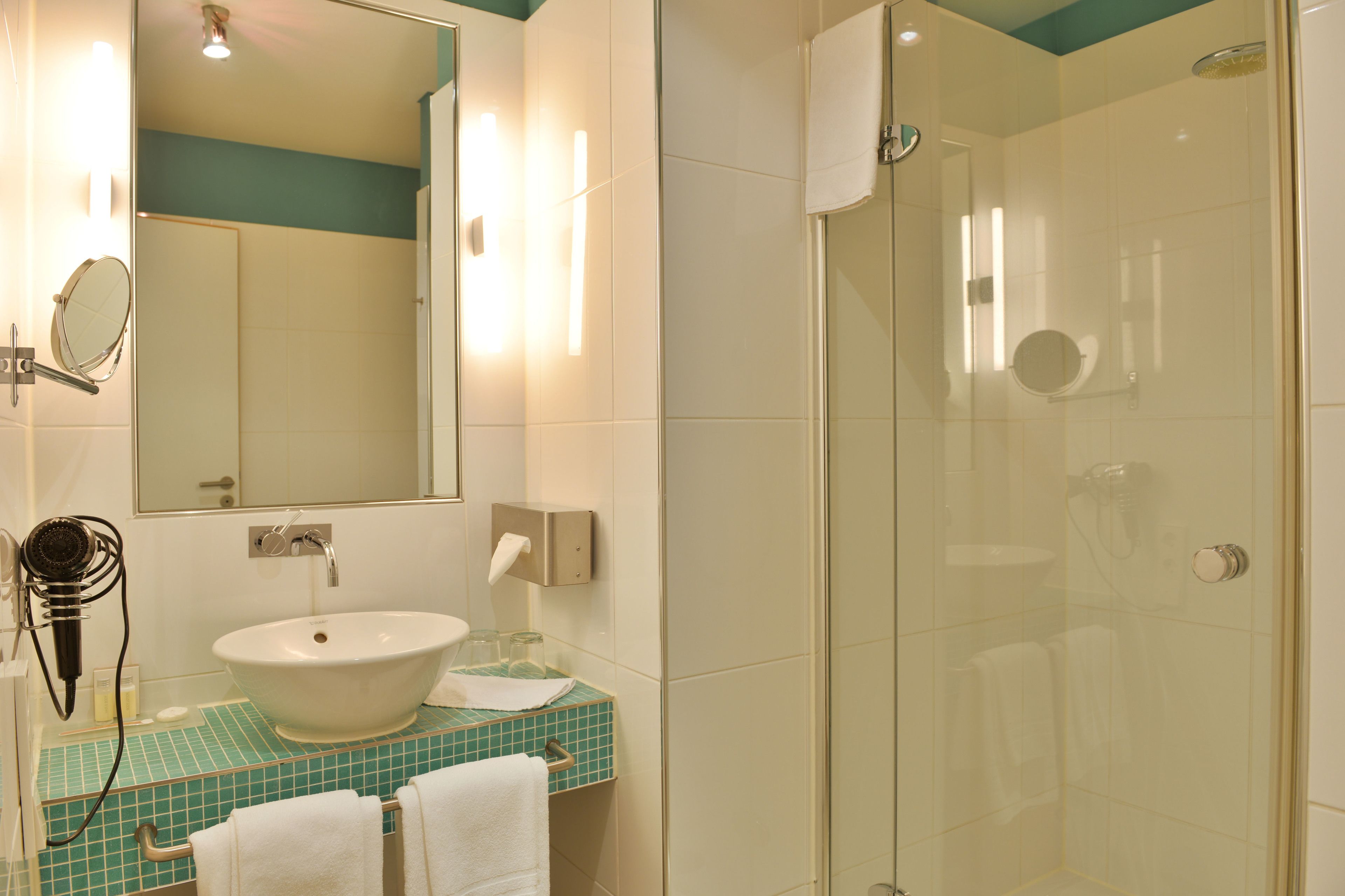 shower, free toiletries, hair dryer, slippers