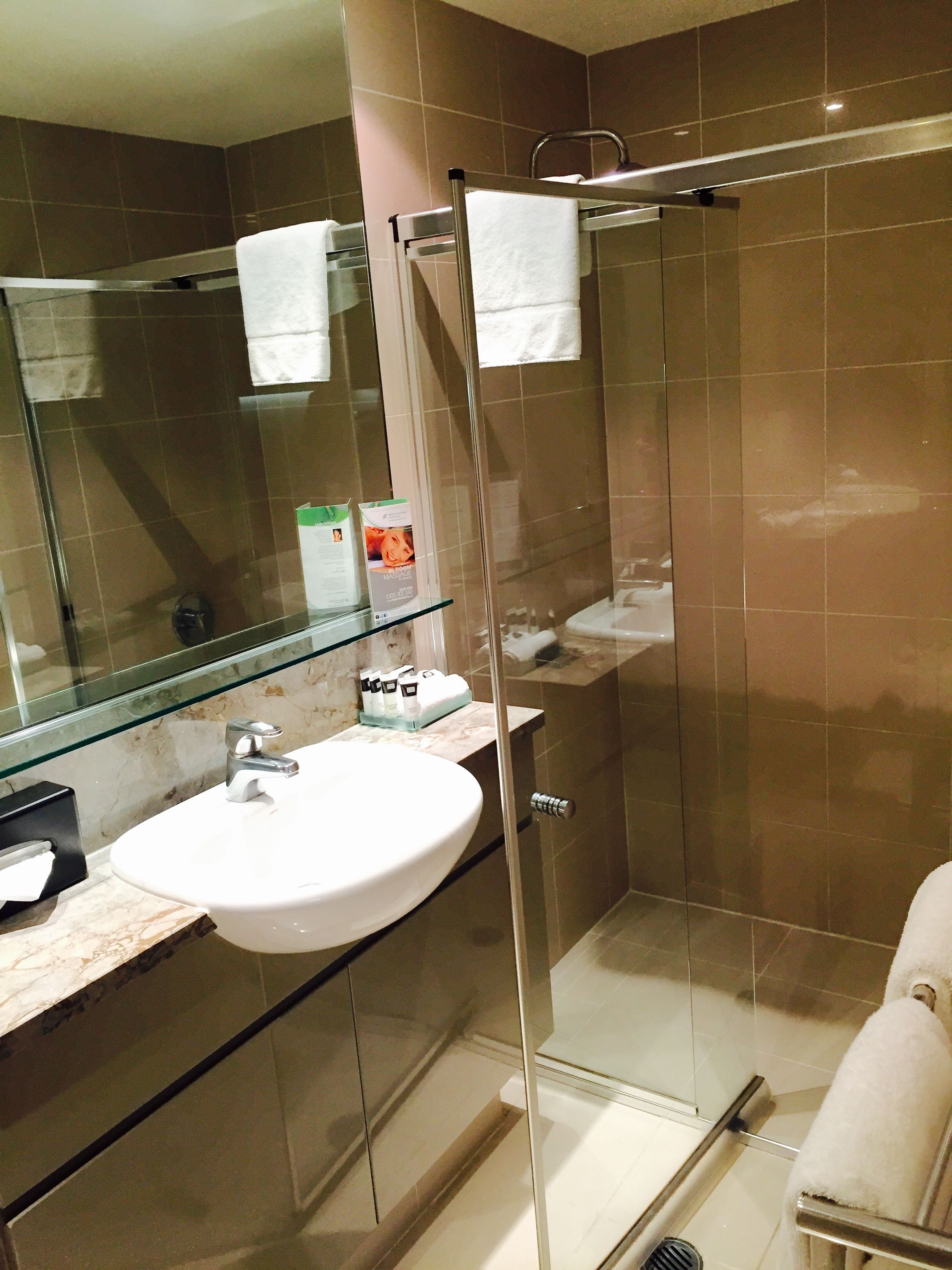 combined shower/bathtub, free toiletries, hair dryer, towels