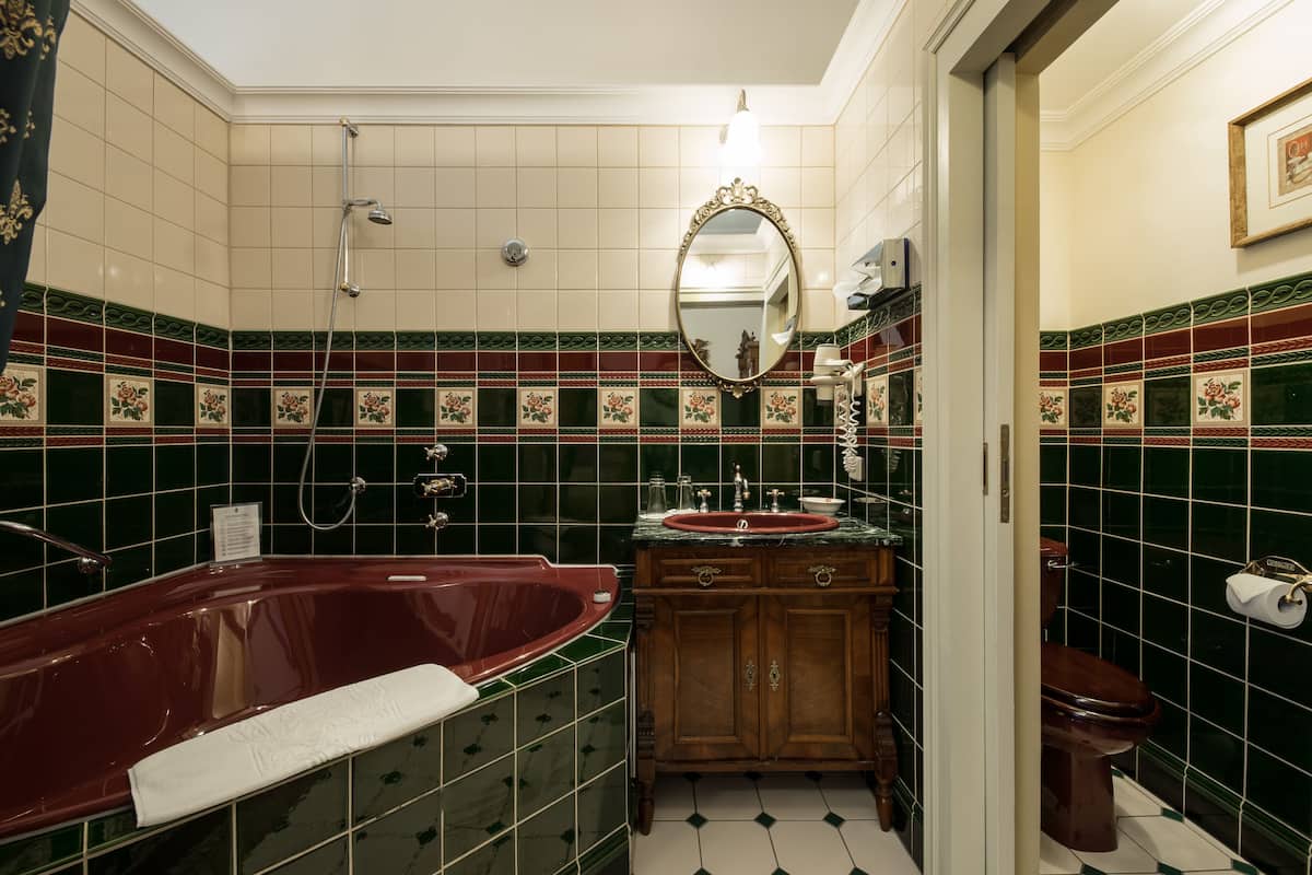 junior suite, jetted tub | bathroom | free toiletries, hair dryer, bathrobes, slippers