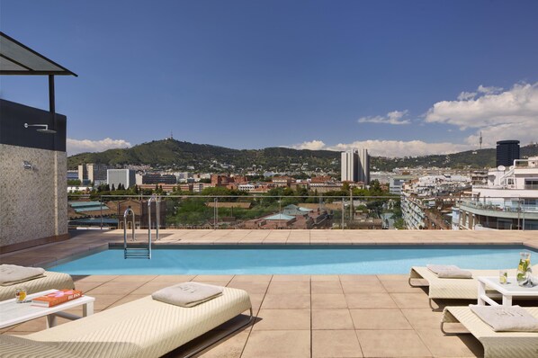 Outdoor pool, sun loungers