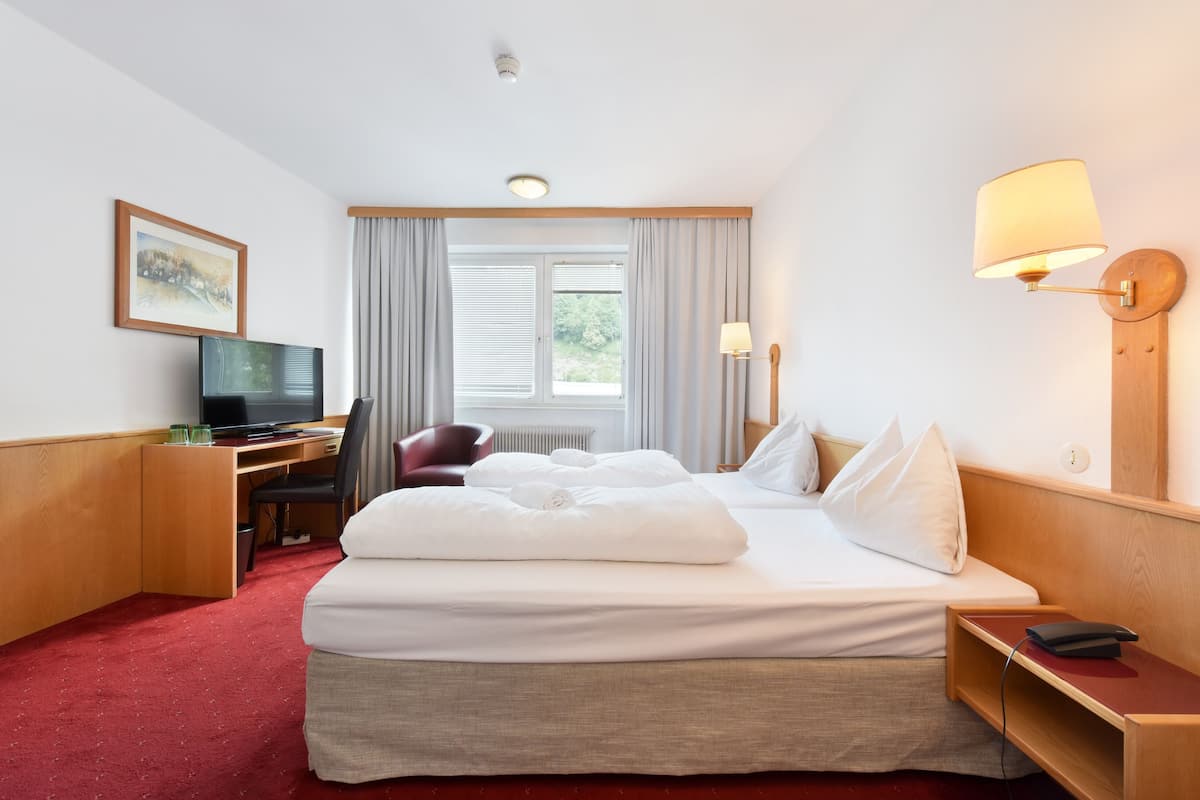 In-room safe, desk, blackout curtains, iron/ironing board (on request)