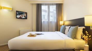 Coffres-forts dans les chambres, bureau, rideaux occultants