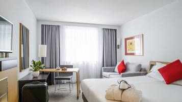 Desk, laptop workspace, blackout drapes, soundproofing