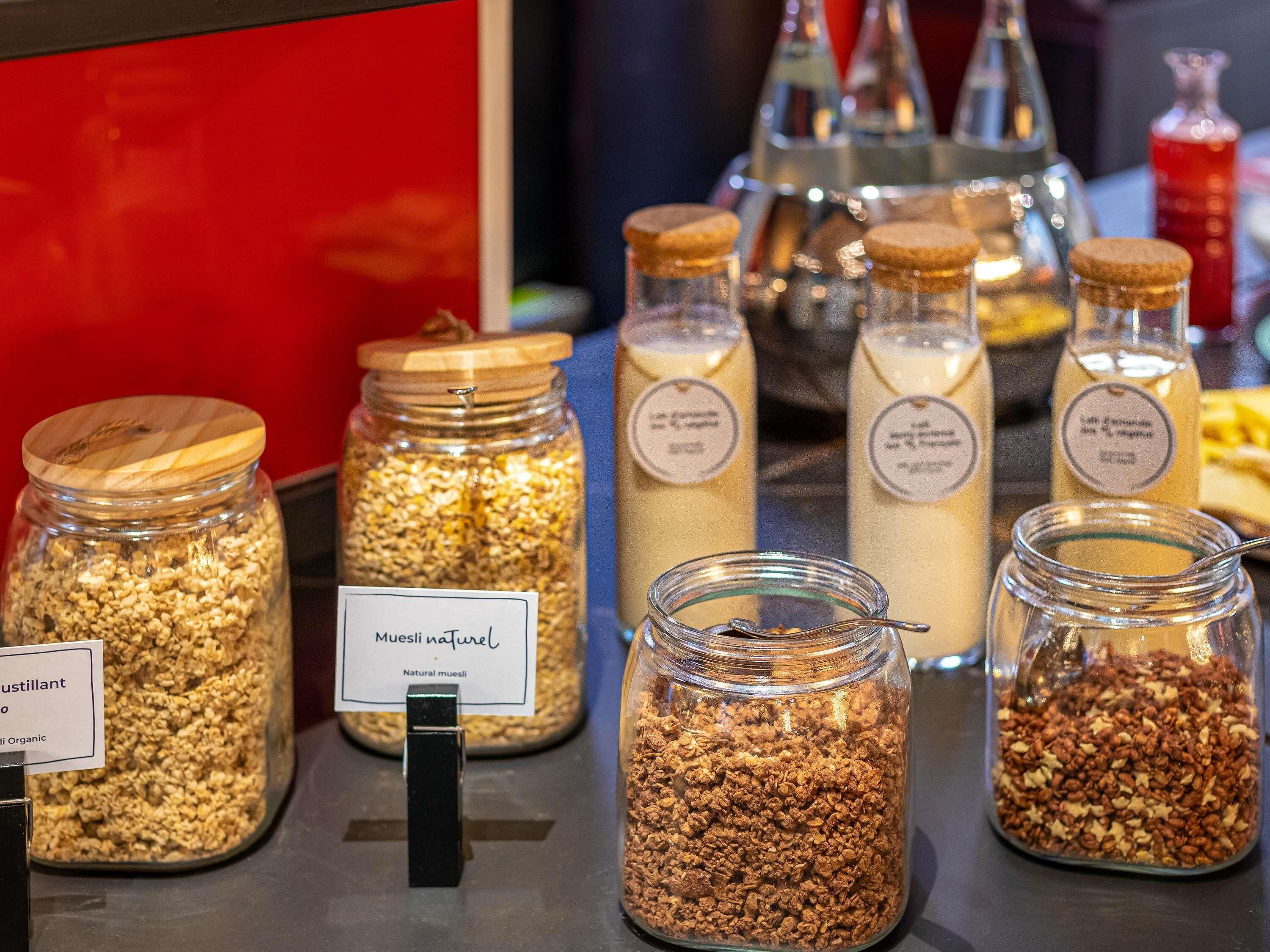 Various jars of muesli and other food items on display.