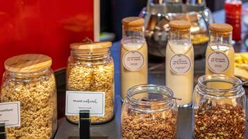 Various jars of muesli and other food items on display.