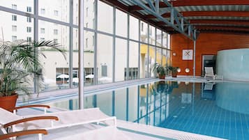 Indoor pool, open 6:00 AM to 10:00 PM, pool loungers