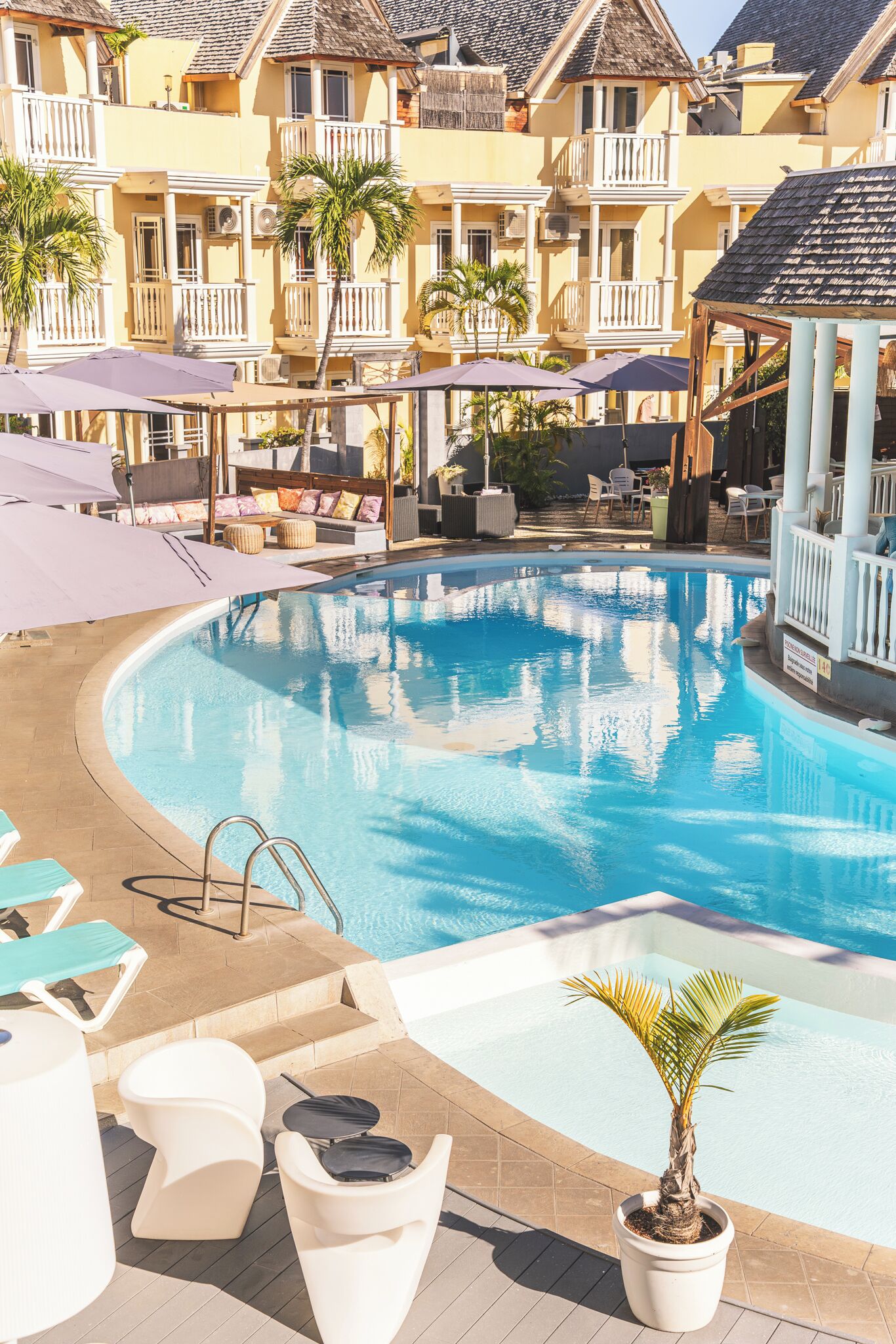 Outdoor pool, open 8:00 AM to 9:00 PM, pool umbrellas, pool loungers