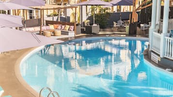 Outdoor pool, open 8:00 AM to 9:00 PM, pool umbrellas, pool loungers