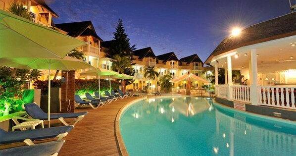 Outdoor pool, open 8:00 AM to 9:00 PM, pool umbrellas, sun loungers