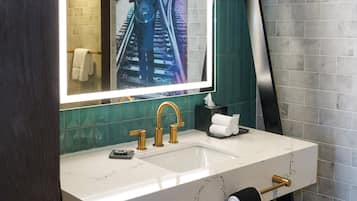 Signature Suite | Bathroom | Shower, hair dryer, bathrobes, soap