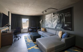 Signature Suite | Living area | 65-inch LED TV with cable channels