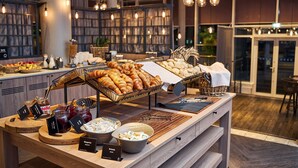 A breakfast buffet with various pastries, spreads, and condiments. - Radisson Blu Latvija Conference & Spa Hotel, Riga (Riga)