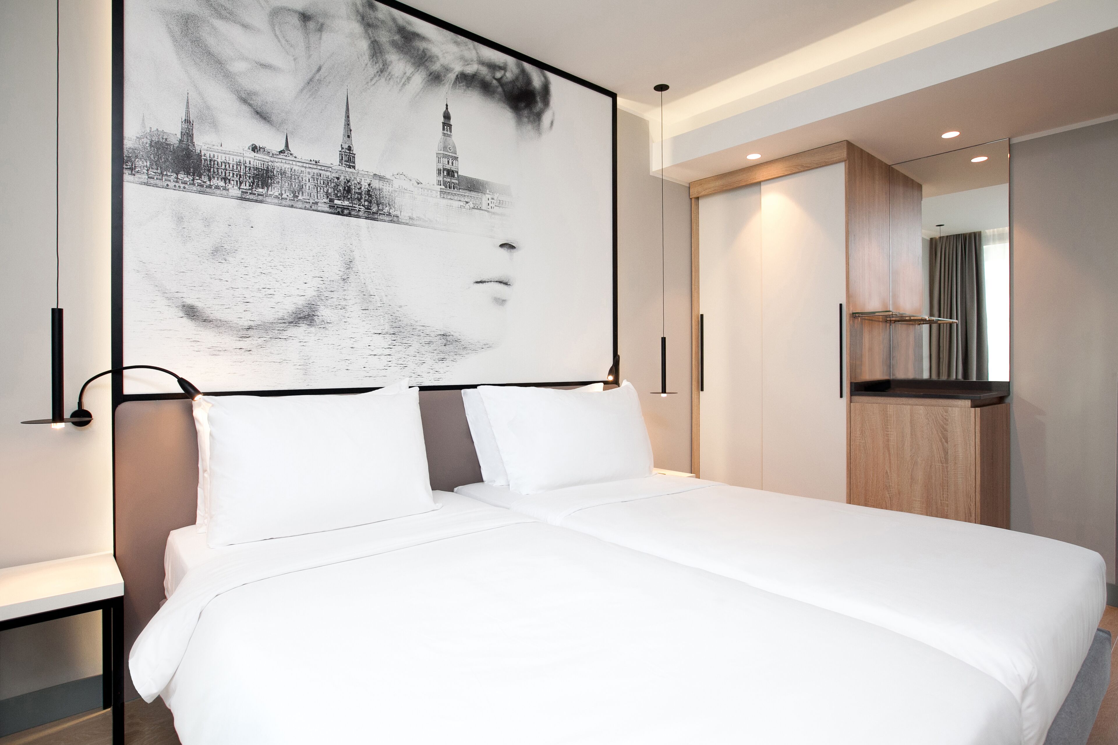 Hypo-allergenic bedding, down comforters, minibar, in-room safe