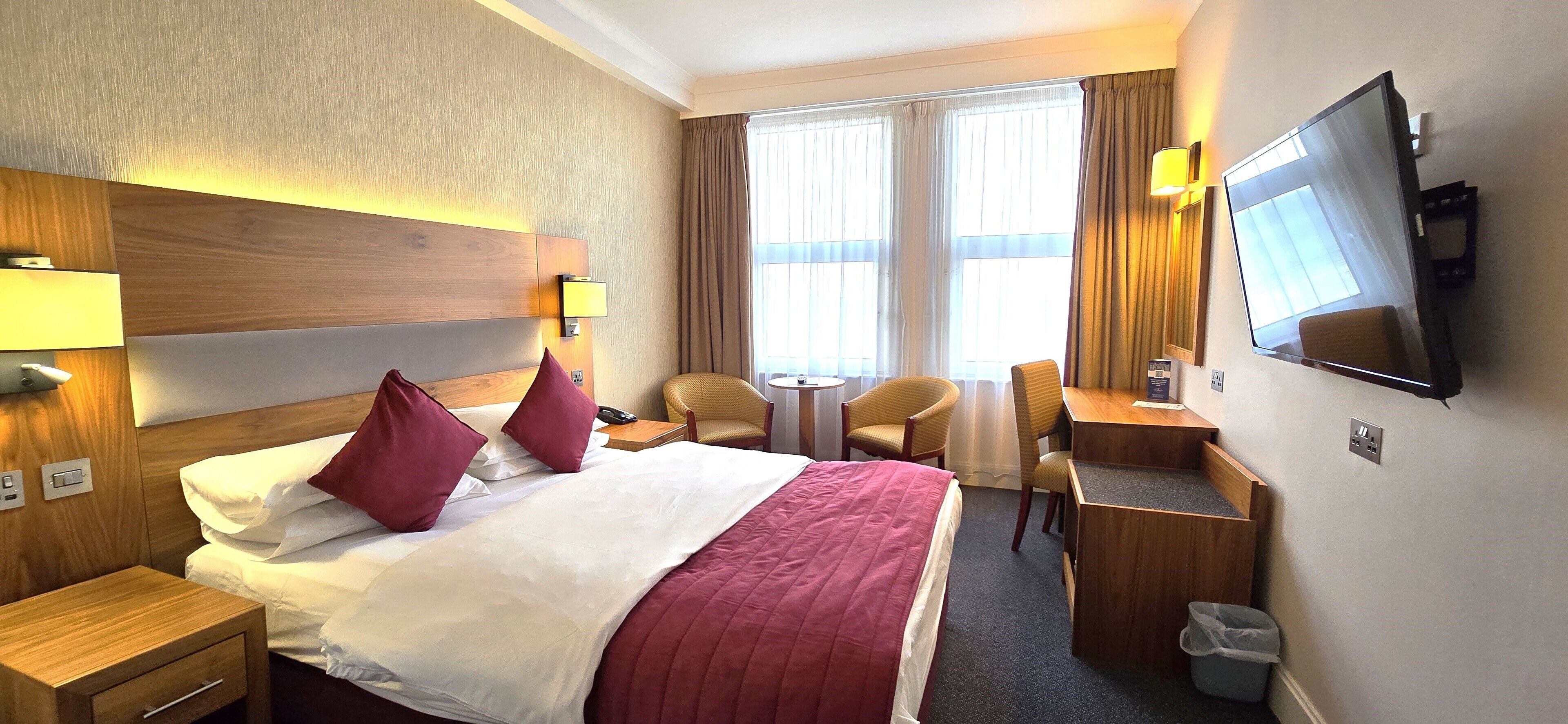 executive double room, sea view | 1 bedroom, desk, blackout curtains, iron/ironing board