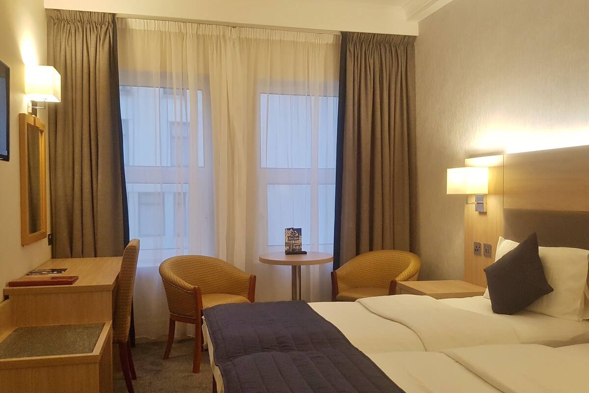 Classic Twin Room | Desk, blackout drapes, iron/ironing board (on request), WiFi (free)