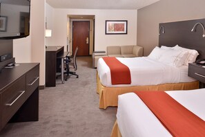A hotel room with a bed, bedside table, desk, chair, and a television. - Holiday Inn Express Portland West/Hillsboro by IHG (Hillsboro)