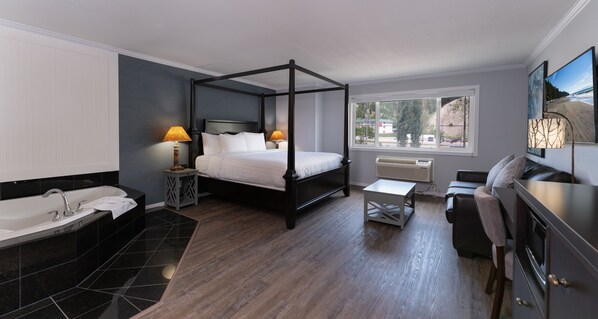 Suite, 1 King Bed, Jetted Tub | In-room safe, desk, soundproofing, iron/ironing board