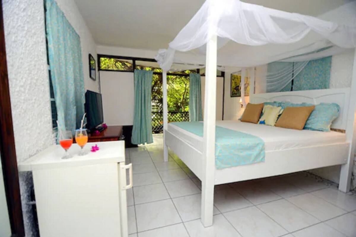 Iron/ironing board (on request), cribs (free), rollaway beds (free)