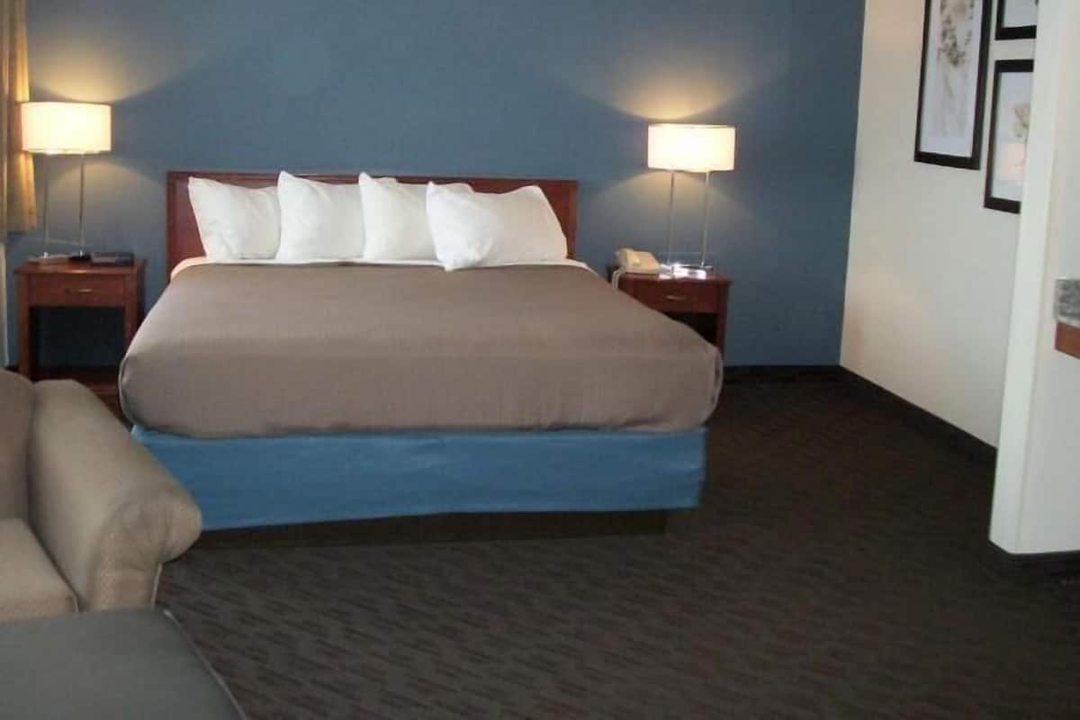 Desk, blackout drapes, iron/ironing board, rollaway beds