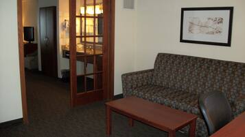 Desk, blackout drapes, iron/ironing board, rollaway beds