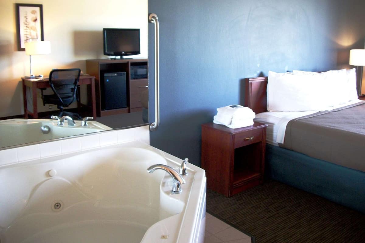 Desk, blackout drapes, iron/ironing board, rollaway beds