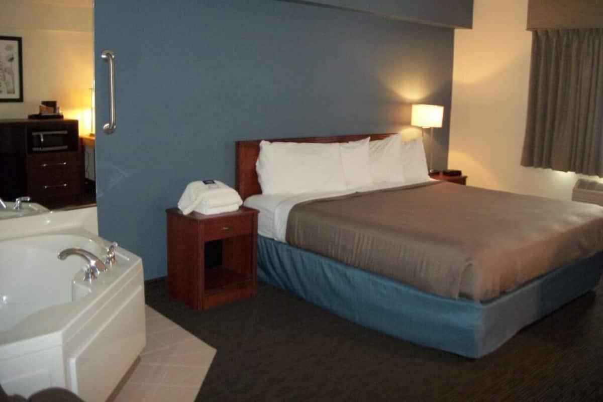 Desk, blackout drapes, iron/ironing board, rollaway beds