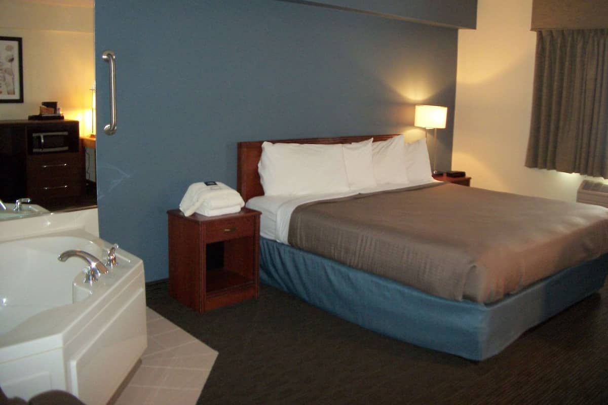 Desk, blackout drapes, iron/ironing board, rollaway beds