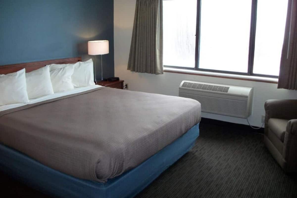 Desk, blackout drapes, iron/ironing board, rollaway beds