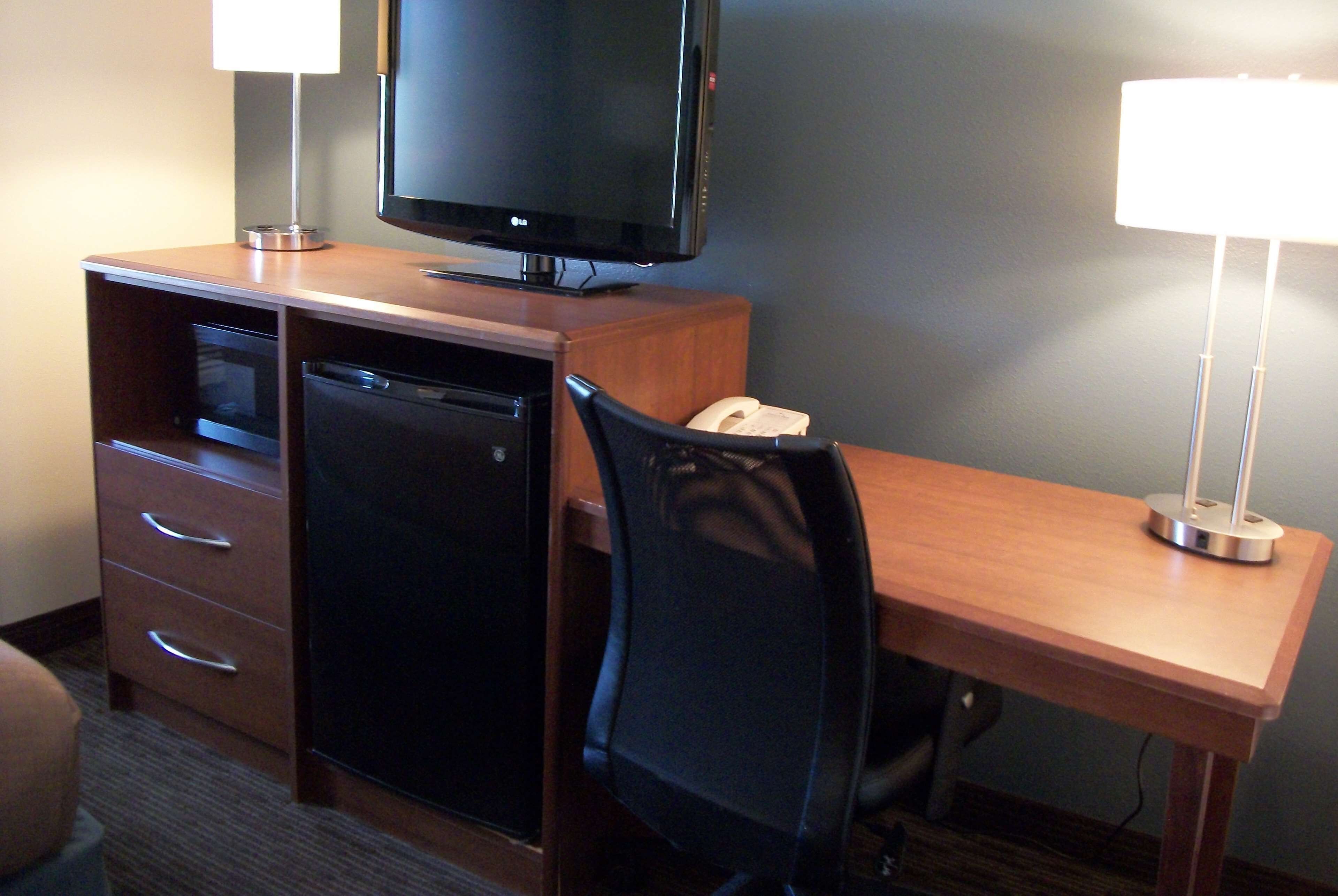 desk, blackout curtains, iron/ironing board, rollaway beds