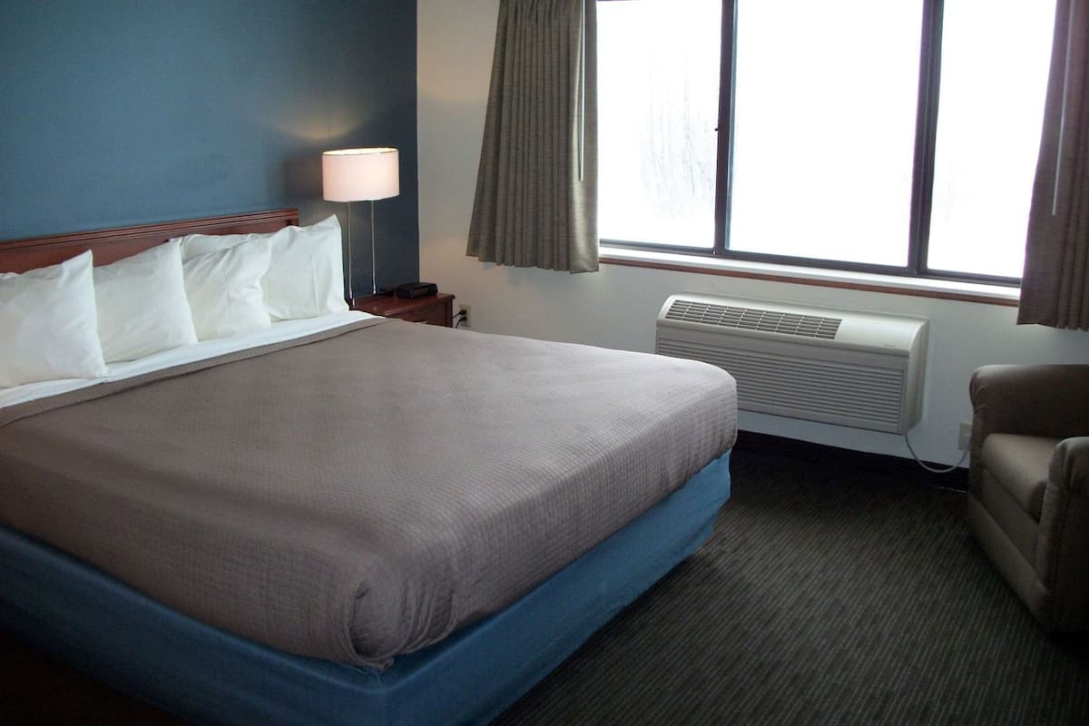 Desk, blackout drapes, iron/ironing board, rollaway beds