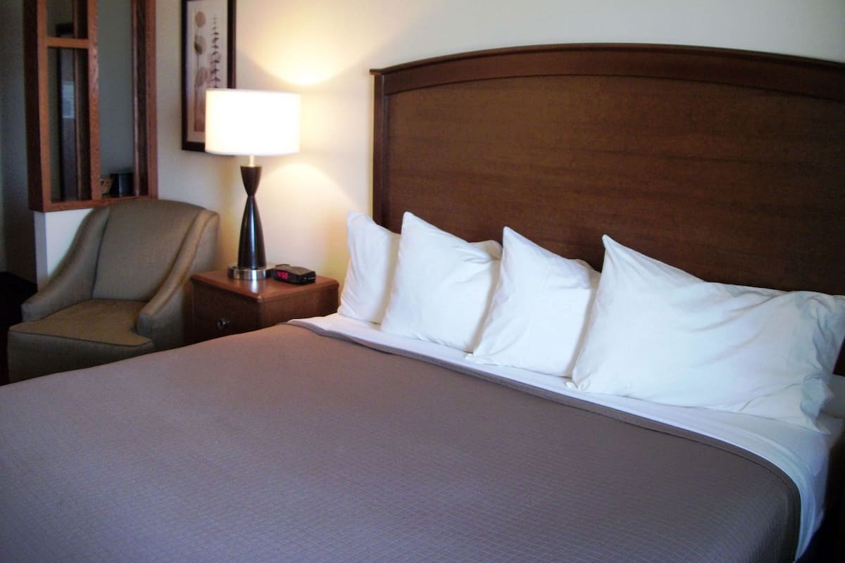 Desk, blackout drapes, iron/ironing board, rollaway beds