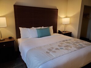 Premium bedding, pillow-top beds, desk, laptop workspace