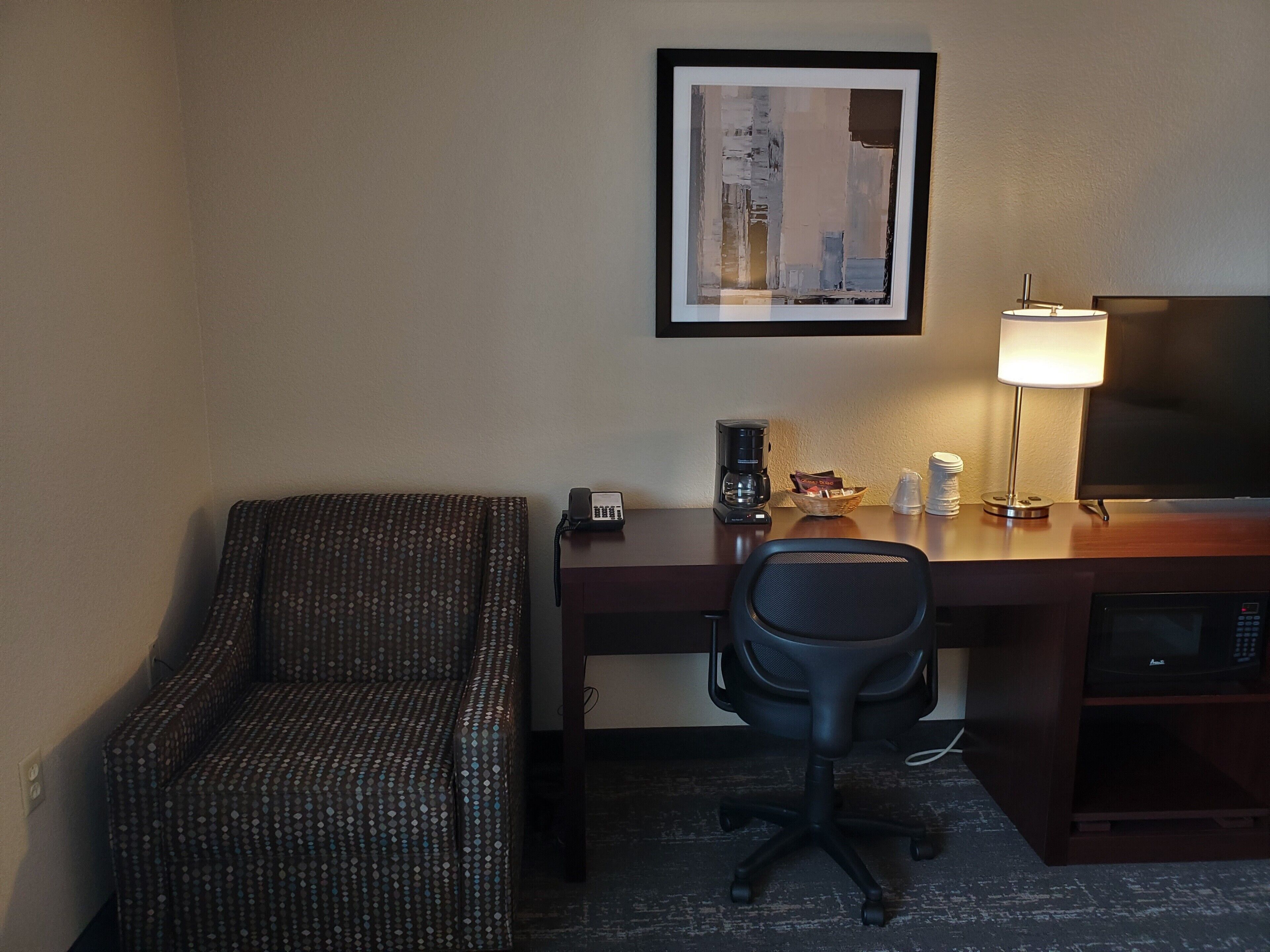 premium bedding, pillow-top beds, desk, laptop workspace