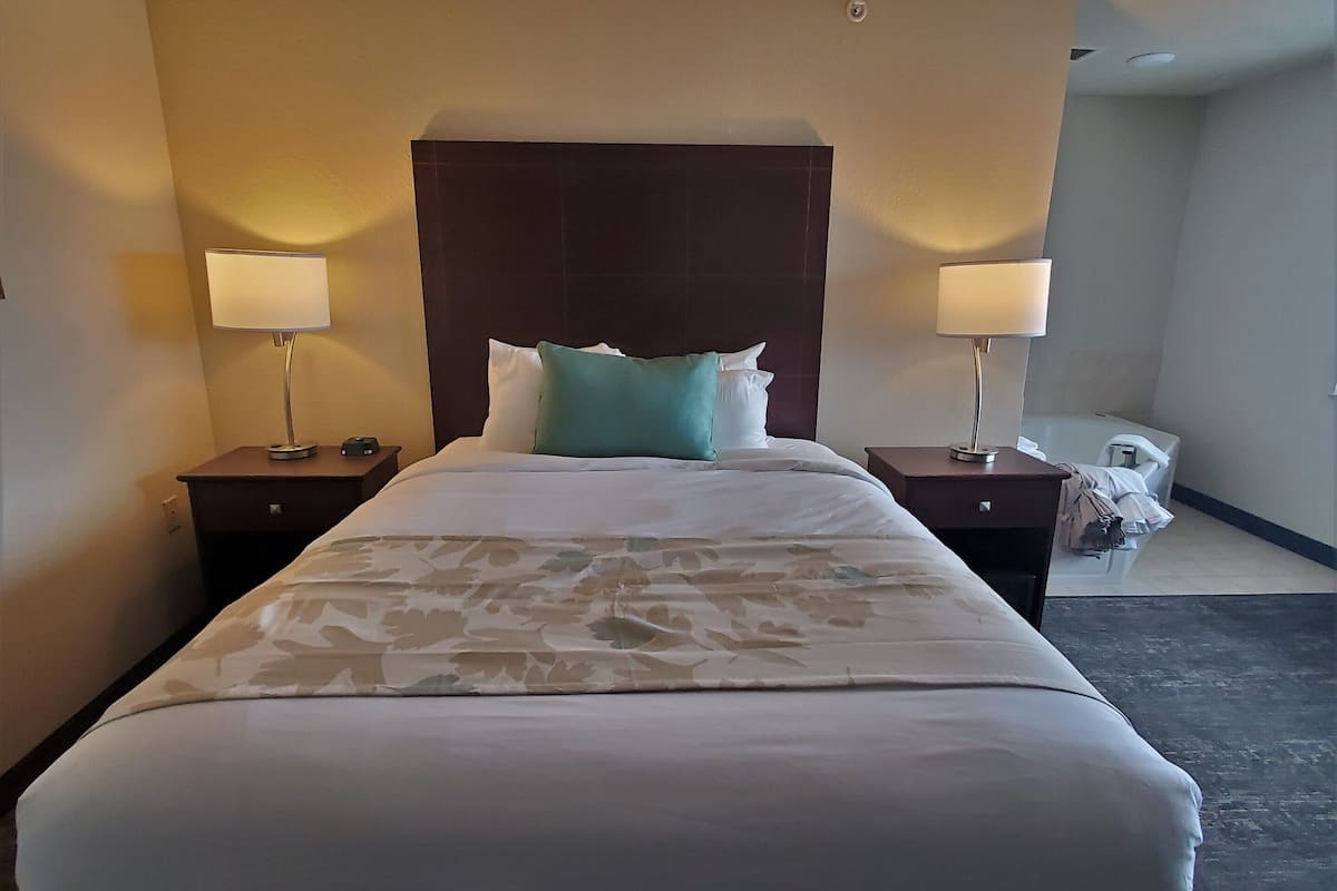 Premium bedding, pillow-top beds, desk, laptop workspace