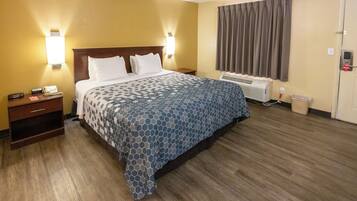 Room, 1 King Bed, Smoking | Memory-foam beds, iron/ironing board, rollaway beds, free WiFi