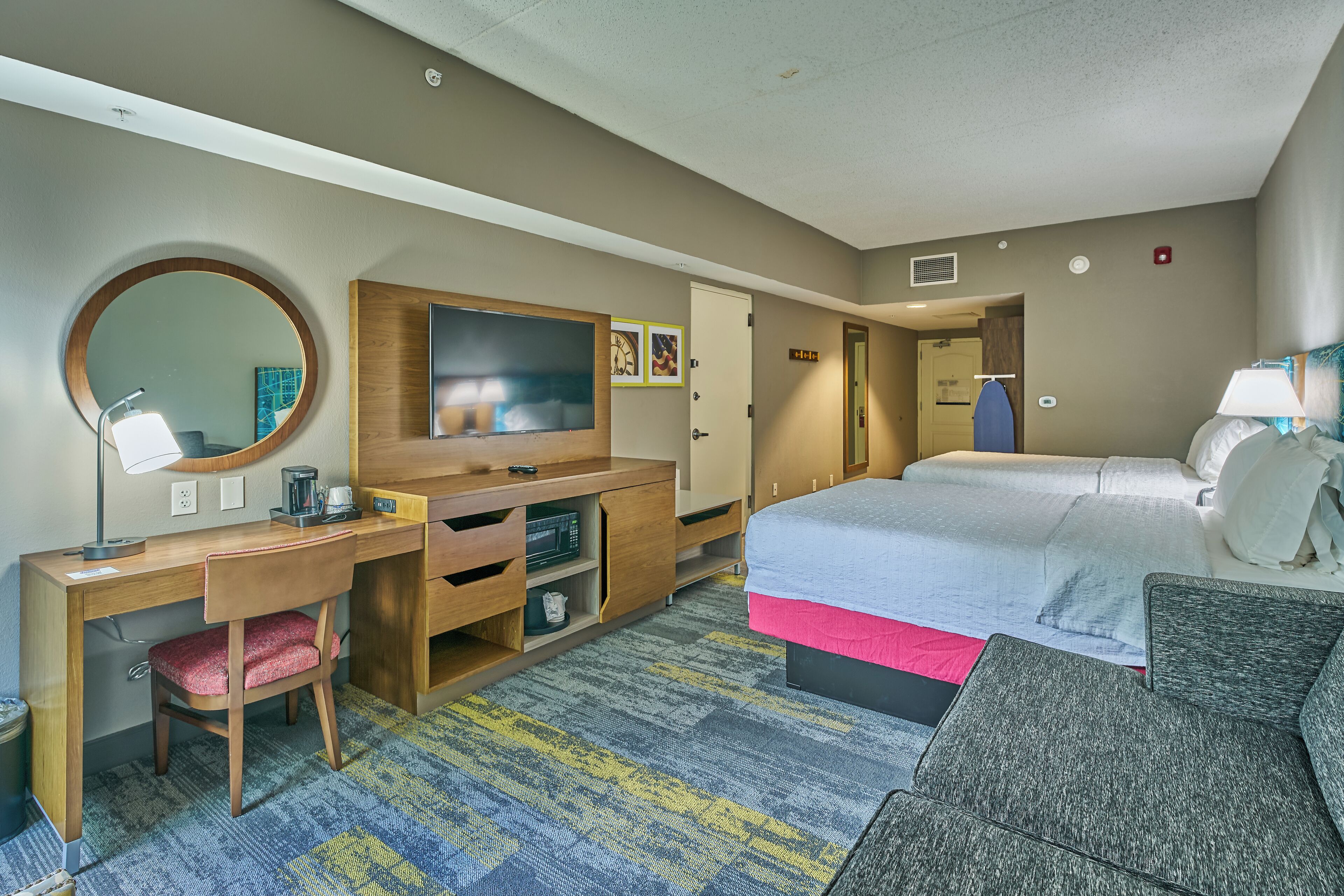 room, 2 queen beds, refrigerator & microwave | iron/ironing board, free cots/infant beds, free wifi, bed sheets