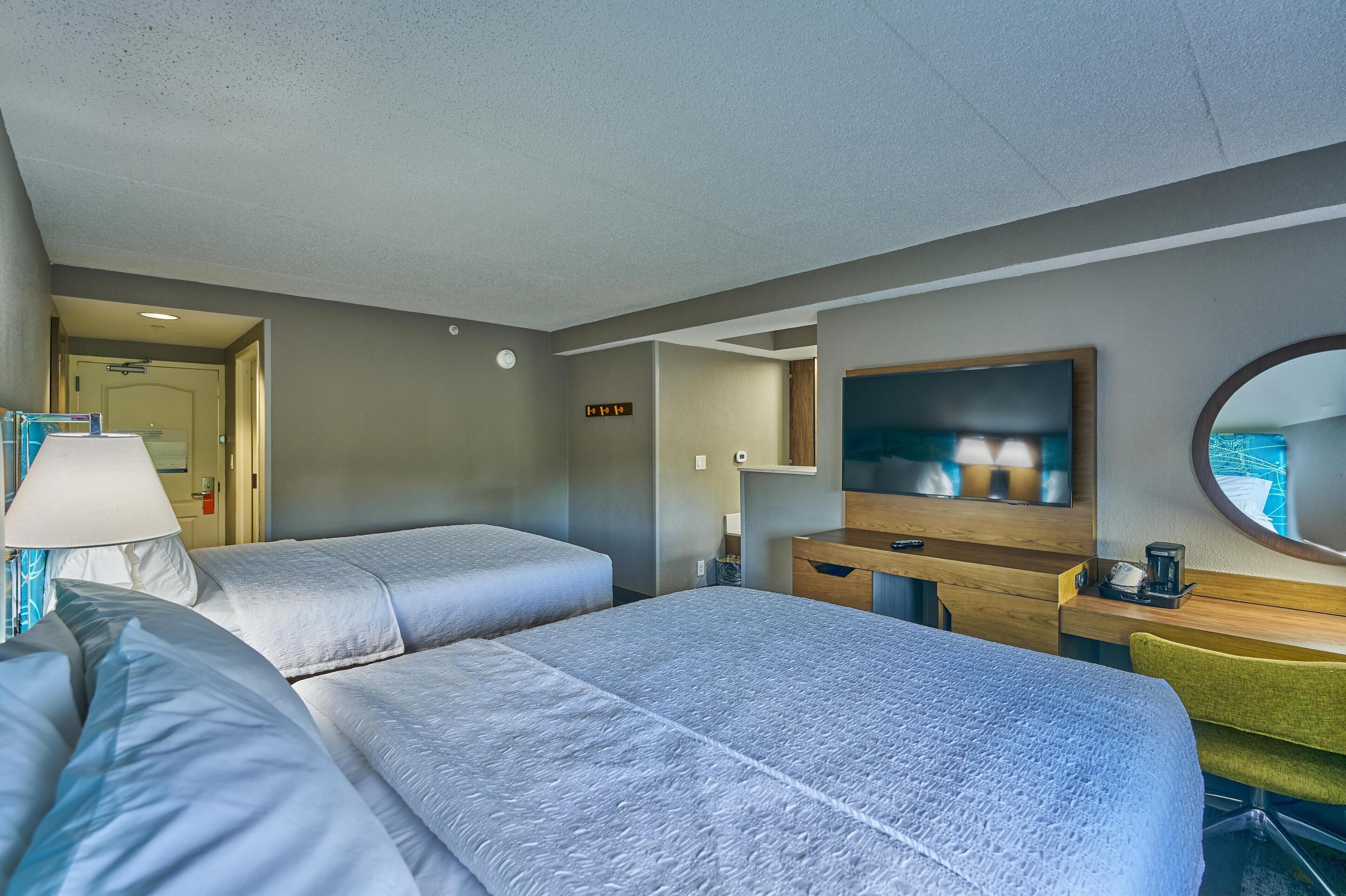 suite, 2 queen beds, non smoking | iron/ironing board, free cots/infant beds, free wifi, bed sheets